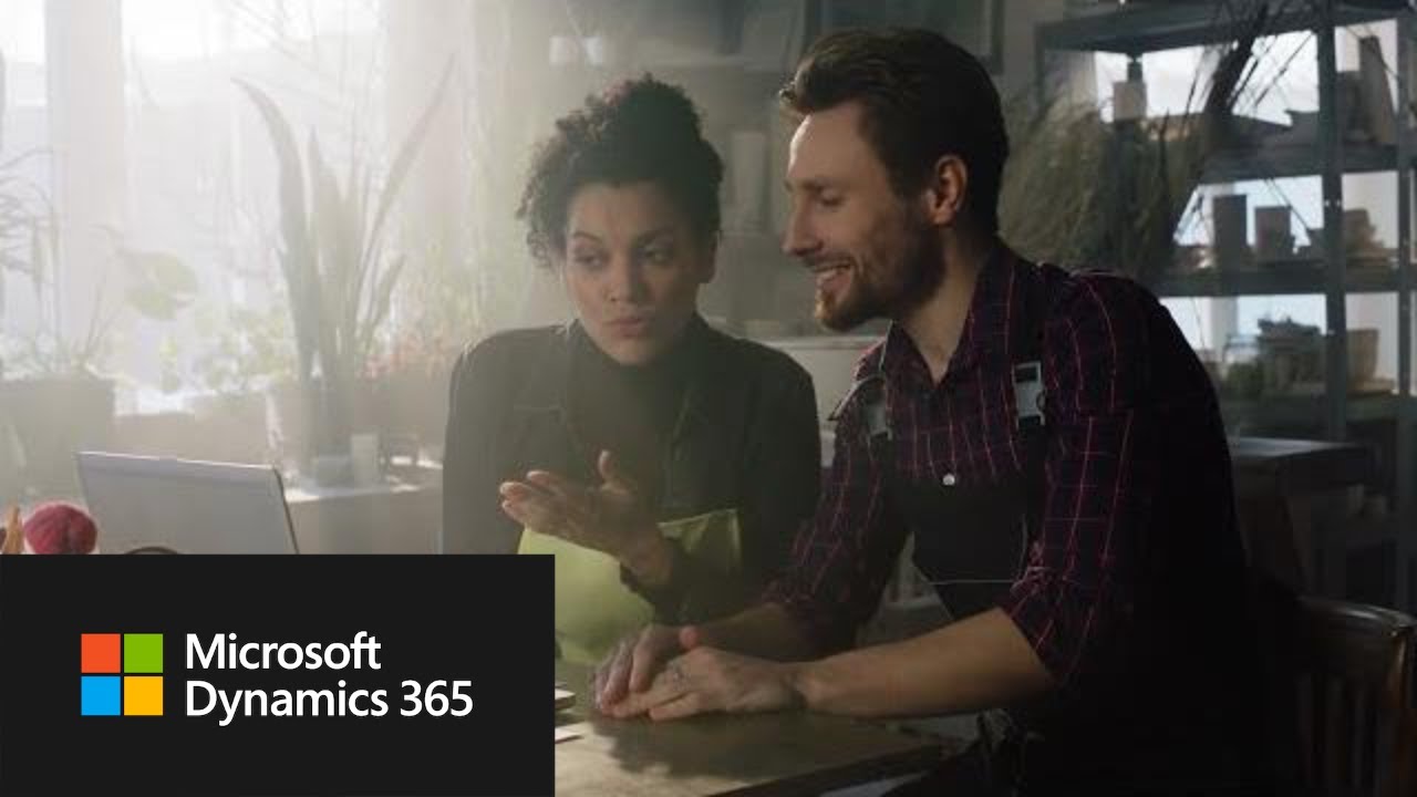 Small business owners collaborating over supply chain data using Microsoft Dynamics 365