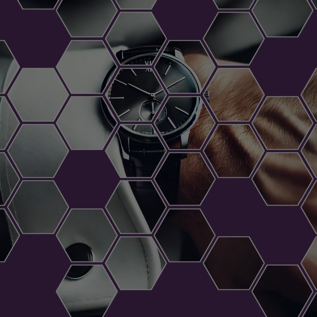 A luxury wristwatch symbolizing precision and reliability, overlaid with a honeycomb pattern, representing Demon Dog's focus on structured and innovative business solutions.